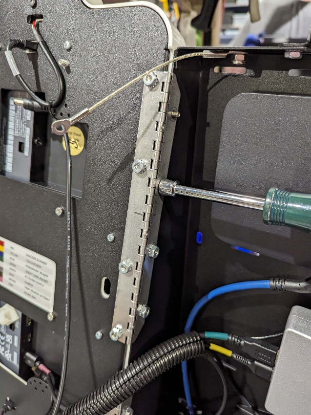 MM6 Mini - removing hinge nuts.jpg
