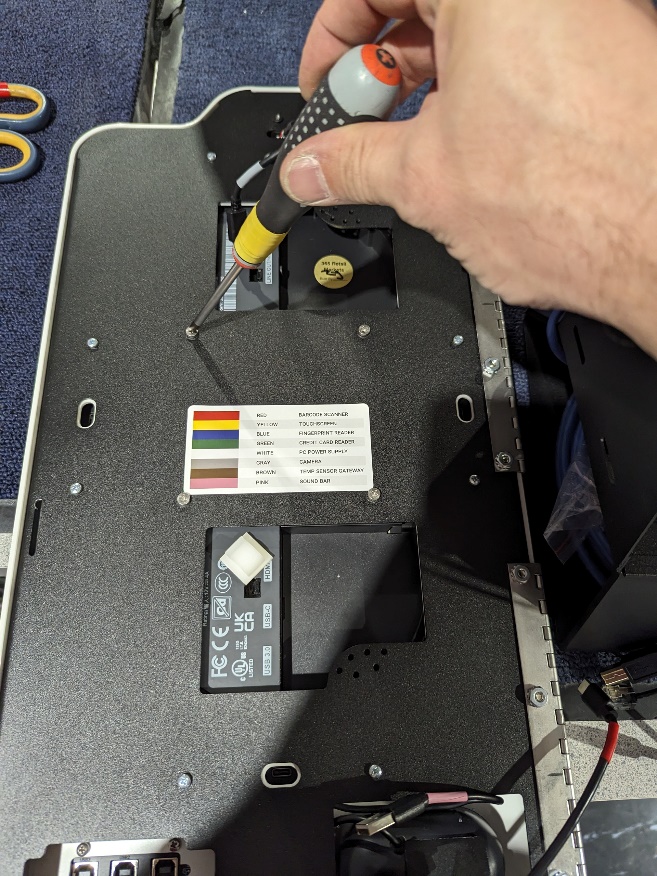 MM6 Mini - large screws being removed from door.jpg