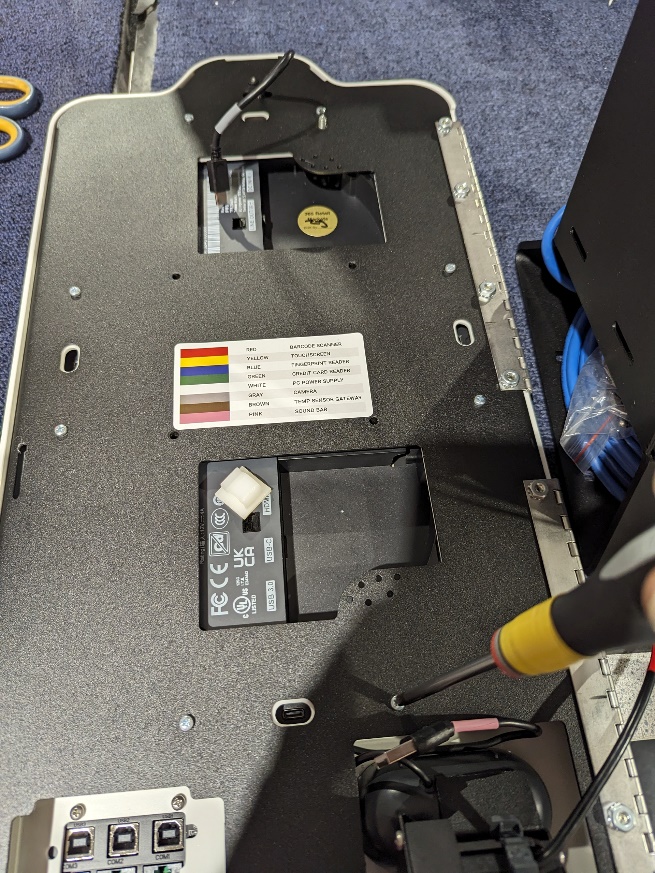 MM6 Mini - small screws being removed from door.jpg