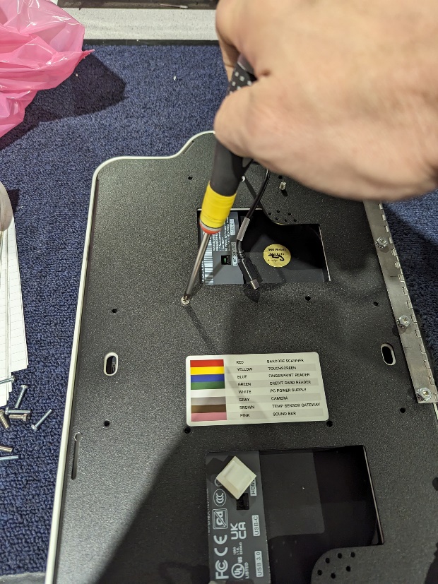 MM6 Mini - reinstalling large screws on door.jpg