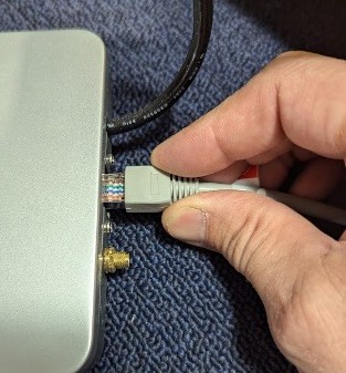 PicoCoffee - Ethernet being plugged into base.jpg