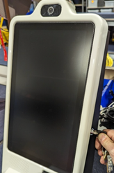 A hand holding a black screen